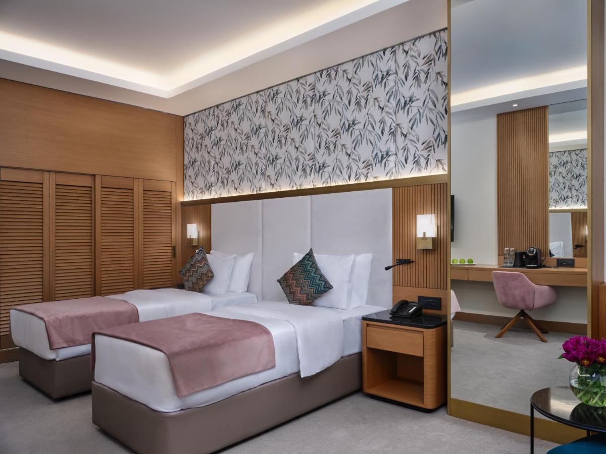 Отель Qafqaz Riverside Габала Экстерьер фото Deluxe Room