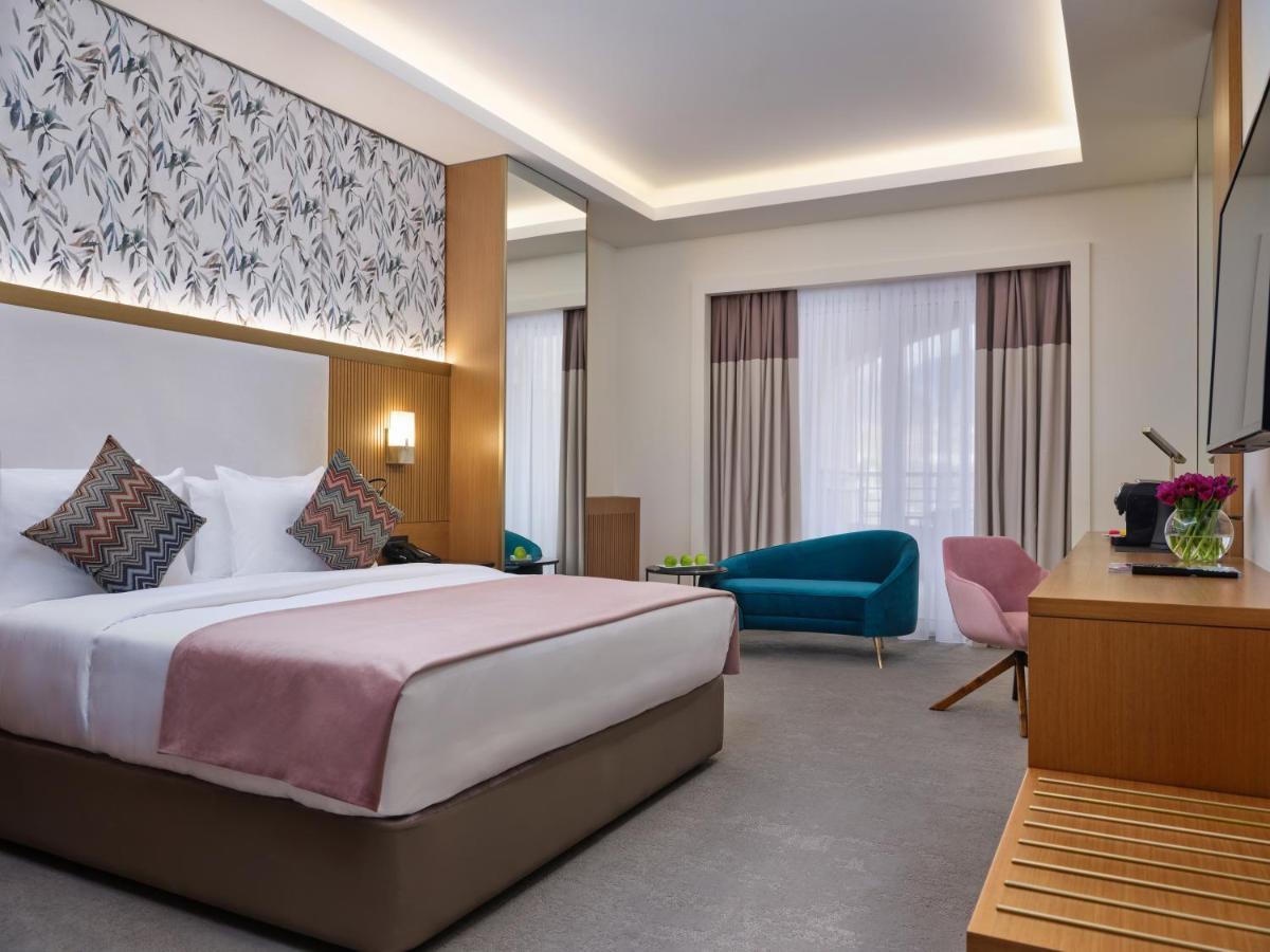 Отель Qafqaz Riverside Габала Экстерьер фото Deluxe Room